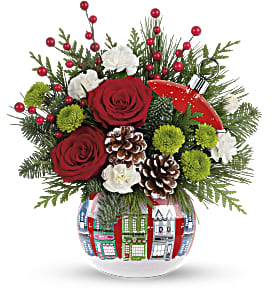 SILENT NIGHT BOUQUET - Capture the wonder of a silent, snowy night with this beautiful holiday gift! The ceramic ornament jar is adorned with a quaint Christmas village and bursts with a spirited holiday bouquet.  Red roses, miniature white carnations and green button spray chrysanthemums are accented with noble fir, cedar and white pine. Delivered in Teleflora's Snowy Village Ornament. Approximately 11 3/4&quot; W x 12 1/2&quot; H