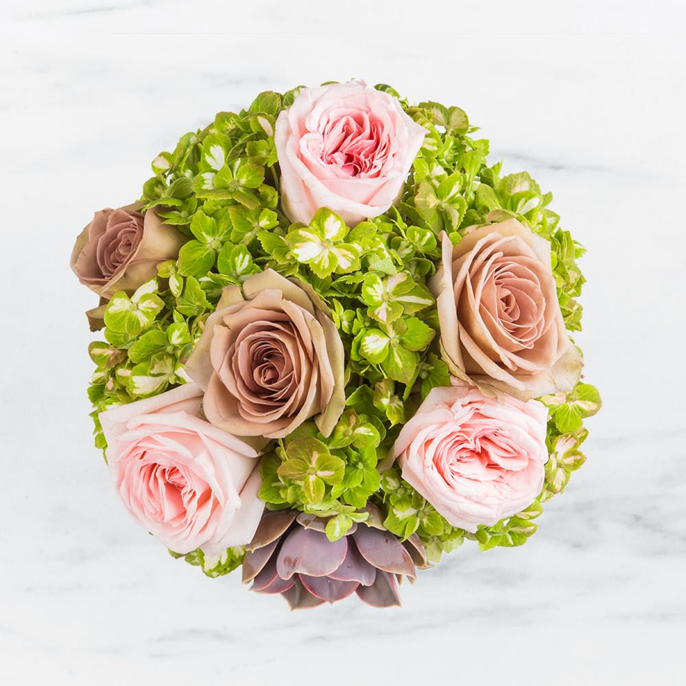 Vintage Garden by BloomNation™ Vintage Garden by BloomNation™ - This vintage style arrangement contains roses, hydrangea, and a succulent. It is the perfect gift for a birthday or just because.