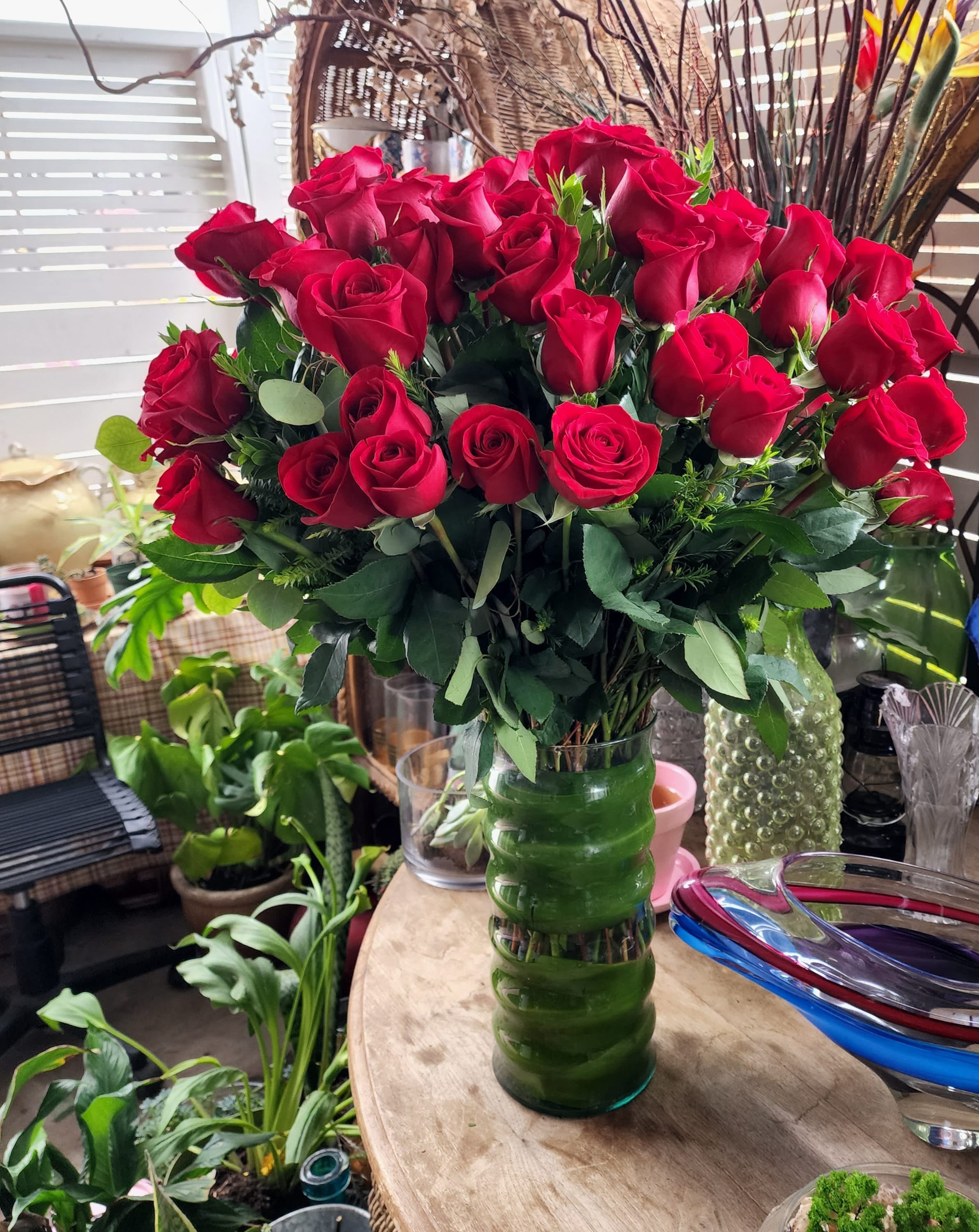 Grandeur Long Stem Rose Arrangement by Barrio Logan Florist  - Go big with your love. Send the most extravagant 4 dozen red rose arrangement for Valentine's day, anniversary celebrations, or declarations of love. This luxury arrangement makes a big statement of &quot;I love you&quot; in 100 red roses.  Approximate Dimensions: 20&quot;D x 32&quot;H