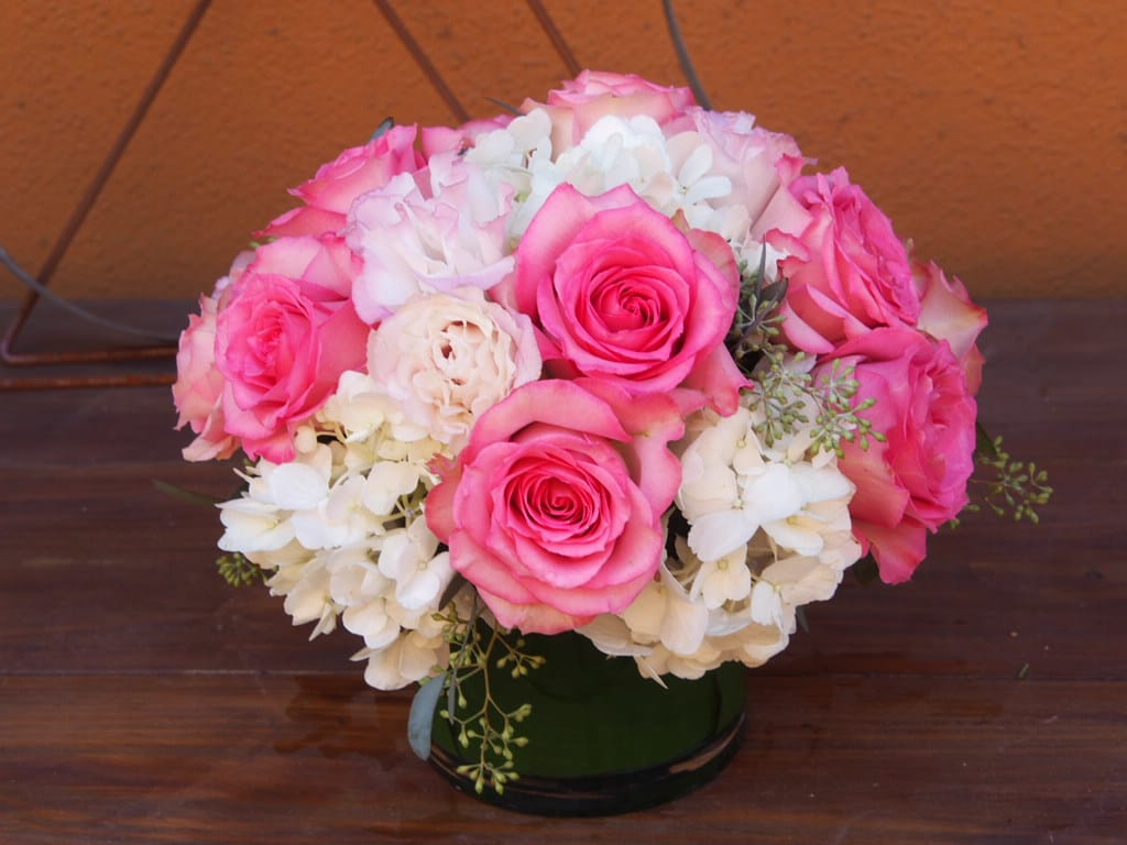 Pink Love Pink Love - Pink and white floral arrangement in 5" cylinder, touches of greens.