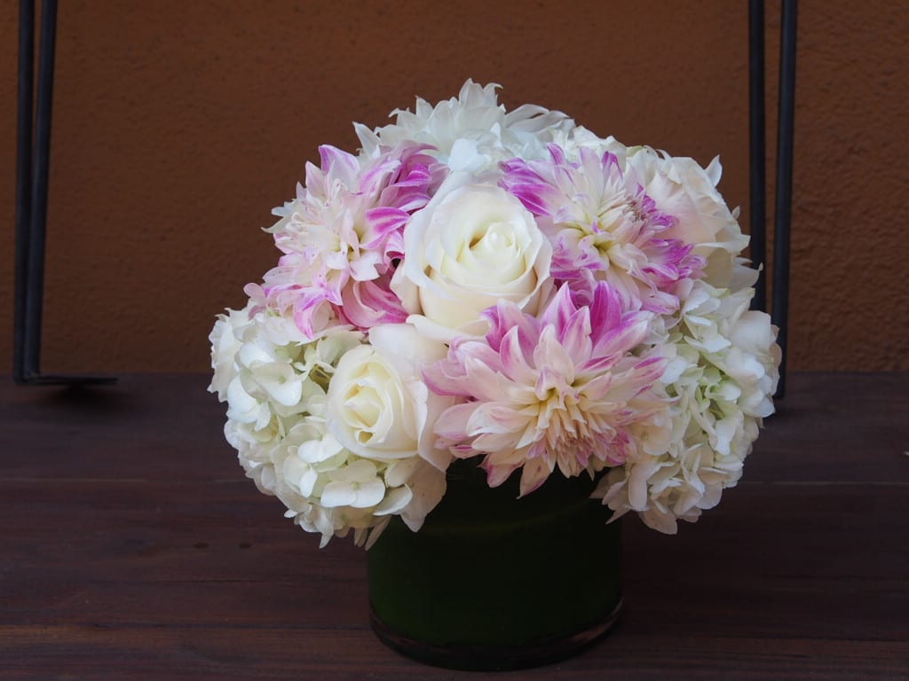 Pink Attantion Pink Attantion - Off white and seasonal pink flowers. Shown here are white hydrangeas, off white roses and dahlias that can sometimes be pink/purple.