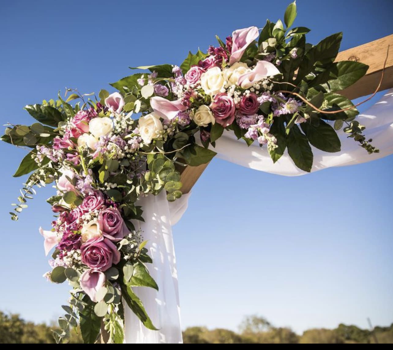 Floral Arch Piece - 3 piece design with roses, callas, eucalyptus, assorted greenery and fillers.