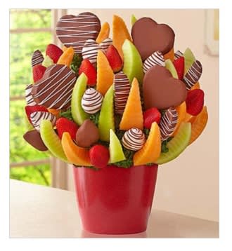 You've Got My Heart - Fresh fruit arrangement of pineapple hearts dipped in chocolaty confection &amp; decorated with white drizzle; strawberries both plain &amp; dipped in white chocolaty confections &amp; decorated with chocolaty drizzle; honeydew &amp; cantaloupe wedges; apple wedges; strawberries All of our dipped fruit is covered in delicious chocolaty confections Hand-crafted and designed by local shops Arrives in a biodegradable red cylinder container; container can be repurposed as a planter; hole in base can be easily popped out to provide drainage; container measures 5&quot;H Arrangement measures 16&quot;H x 11.5&quot;D Delivered fresh to their door with Same-Day Delivery Allergy Warning: Fruit Bouquets products may contain peanuts and/or tree nuts. We recommend that you take the necessary precautions based on any related allergies.