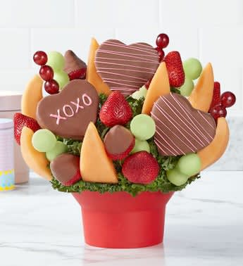 Hearts and Kisses - Give a gift that will get you plenty of X’s and O’s this Valentine’s. Heart-shaped pineapple slices dipped and decorated with XOXO, together with strawberries, melon and more. Add to the sweetness of your sentiment with our signature dipped berries, perfect for sharing with someone you love.
