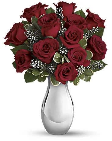 Teleflora's Winter Grace Bouquet Teleflora's Winter Grace Bouquet - One dozen ravishingly red roses showcased in a stunning silver reflections vase - what a glorious Christmas bouquet. Classic and contemporary at the same time, it is a gift they'll love - with a dazzling keepsake vase they'll treasure.