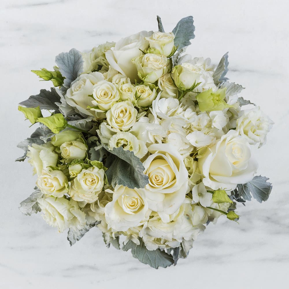 Dressed to Impress By BloomNation™ - Do you know someone who’s hard to impress? Of course you do. This arrangement was engineered specifically for that person. Knock them off their feet (not literally - flowers are instruments of peace) with this magnificent piece of floral artistry. 