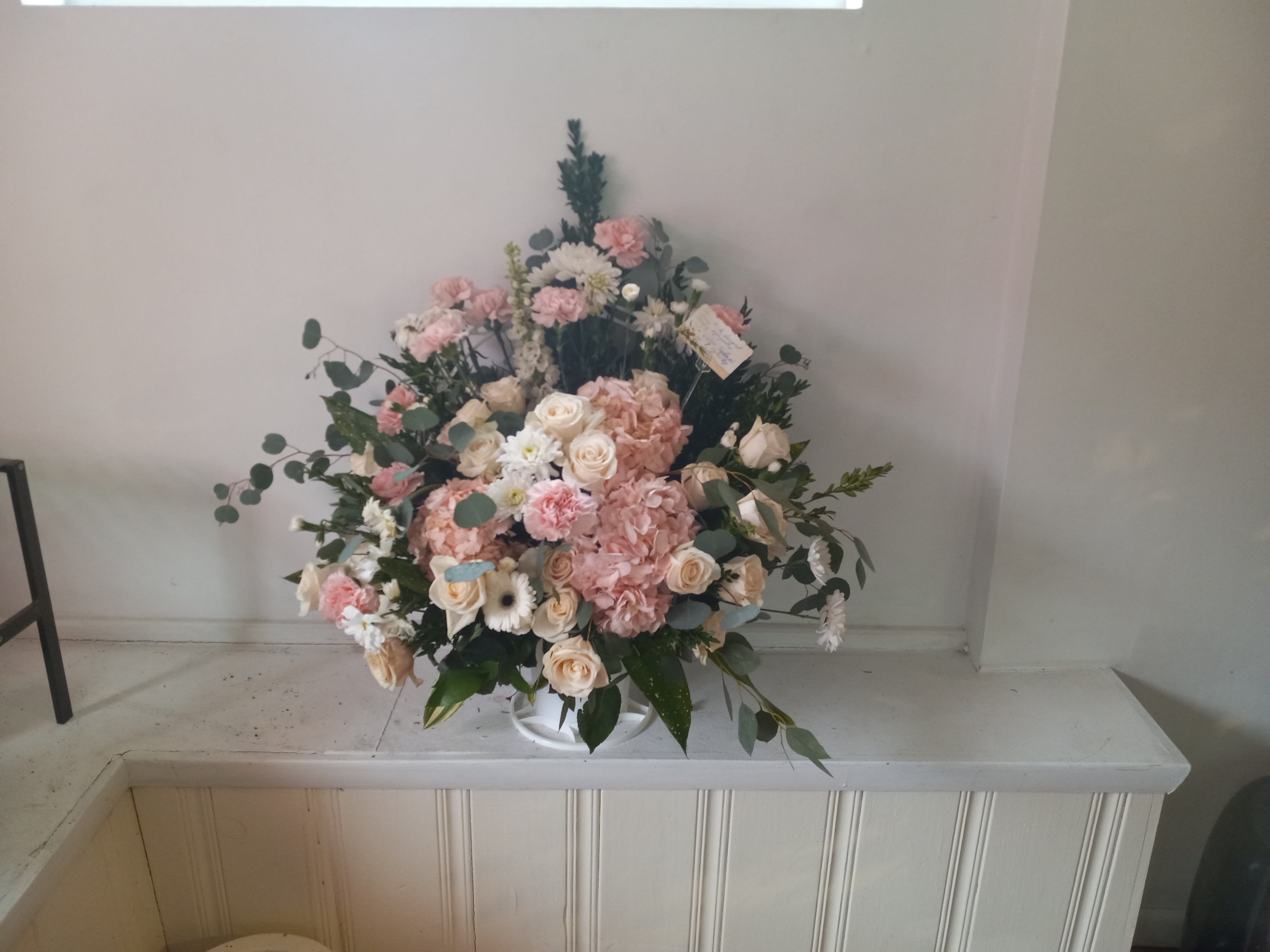 &quot;Sweet memory&quot; funeral basket  - Light pink &quot;cloud&quot; of pink hydrangea surrounded by white and cream roses and spark of pink carnations
