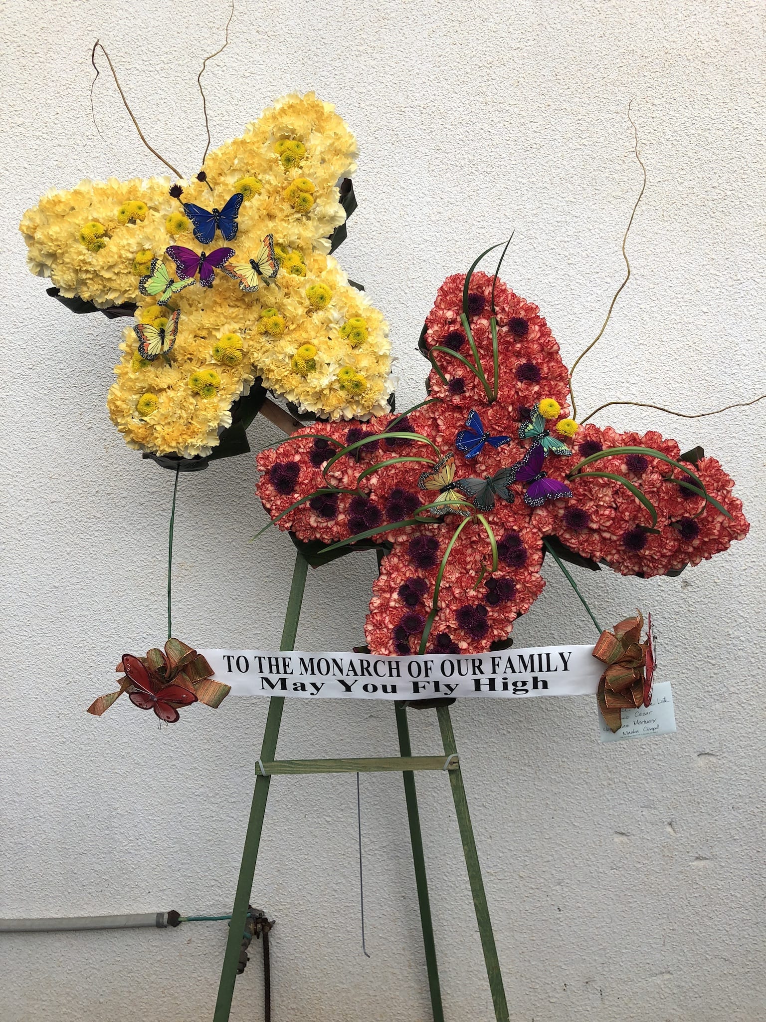 Monarch Wreath - W40010 - Custom butterfly wreath using yellow and red carnations. 