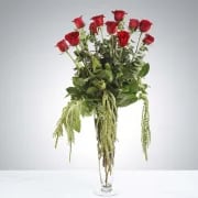 Forever Type of Love by BloomNation™ - Make a statement with this dramatic arrangement. With a tall vase and modern greens, this mix of the classic 12 dozen roses with a gothic romance twist stands the test of time. Perfect for valentines day, anniversaries, or any type of romance.   APPROXIMATE DIMENSIONS: 11&quot; W x 25&quot; H