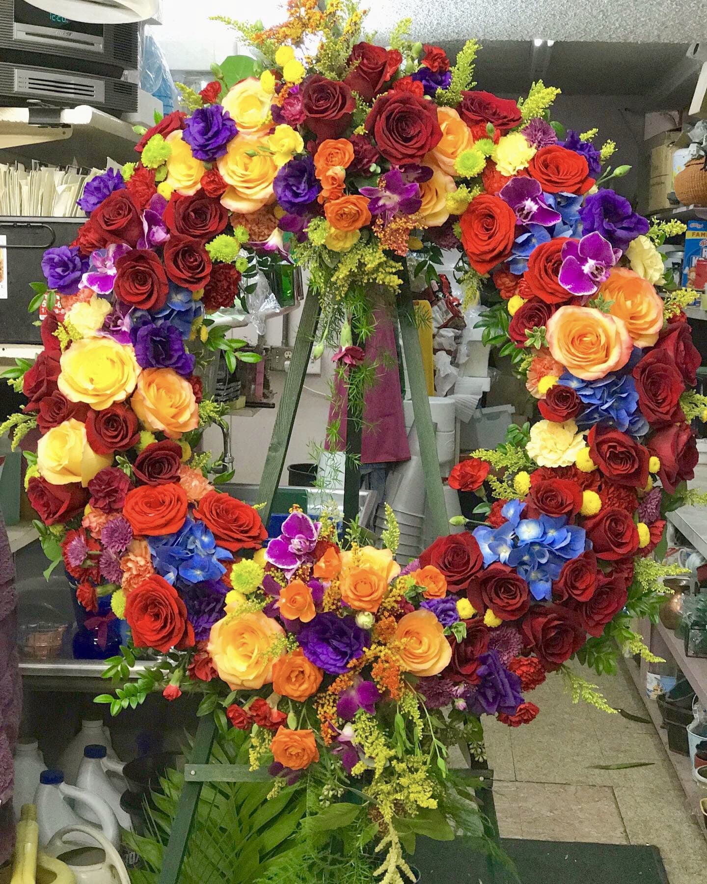 Warm Wishes Tribute - Warm jewel toned fresh flower sympathy easel.