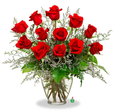 Twelve Red Roses - A charming bouquet of a dozen fresh and fragrant red roses, adorned with just a bit of greenery, is a classic Valentine’s Day gift. Delivered in a clear glass vase, this bouquet is also a romantic standard for any day of the year.