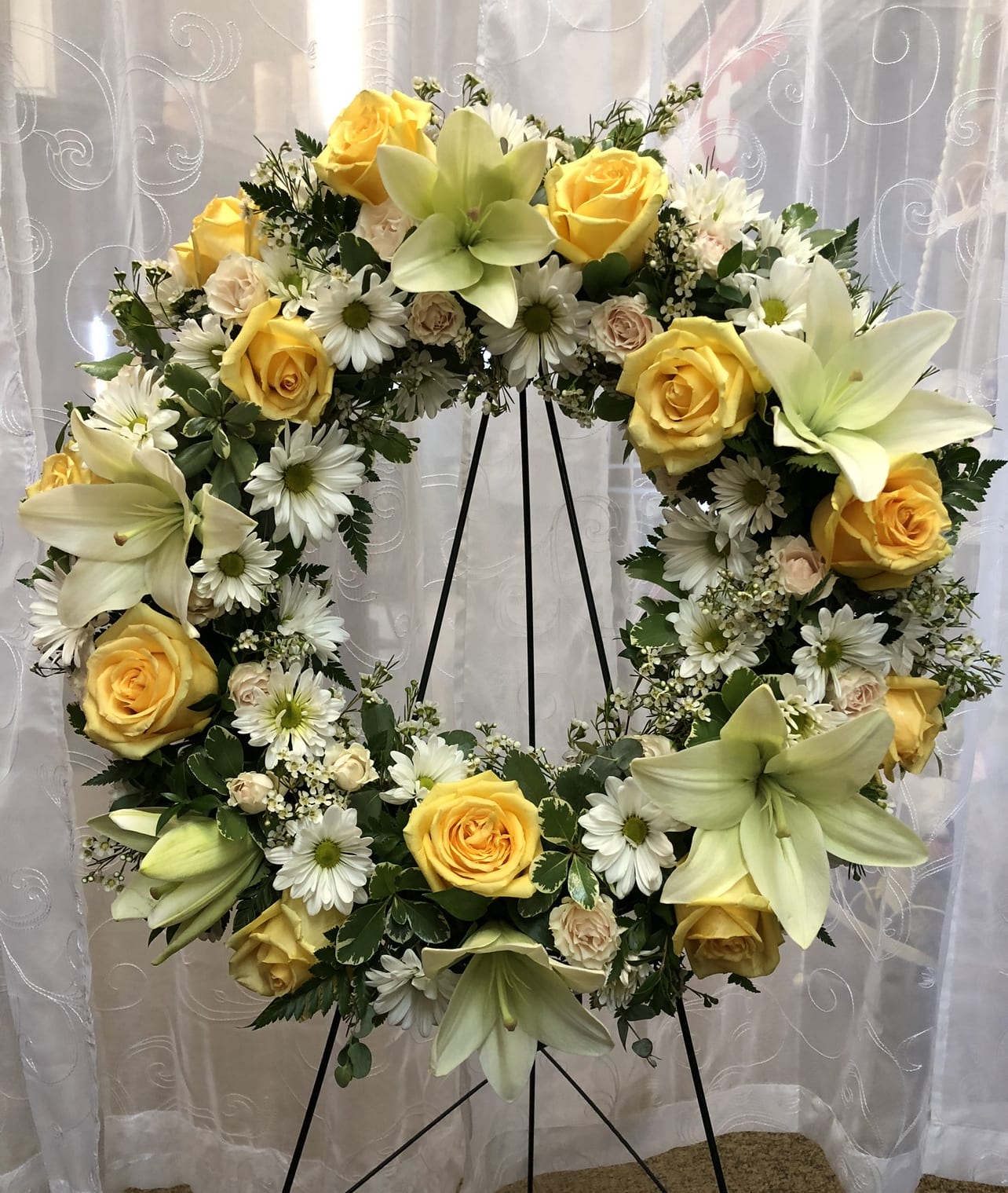 Sweetest Wreath  - Family and friends will recollect how special their loved on was with this gentle and timeless circle of sweet fragrant blond to celebrate sweet memories. 