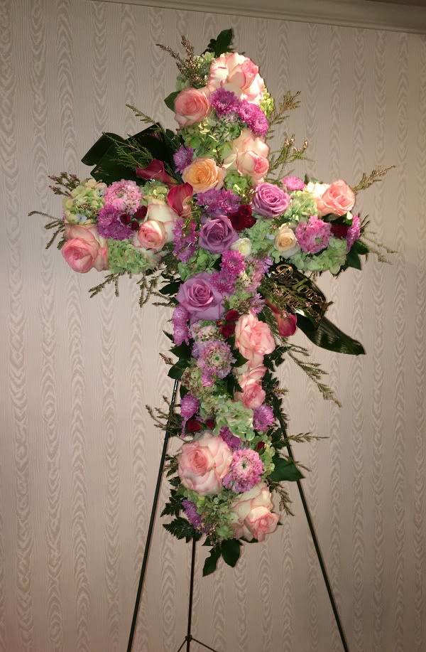 Our Deepest Faith - Pride, dignity, admiration and faith are on beautiful display in this moving sympathy arrangement. It's a meaningful way to deliver your heartfelt message. 