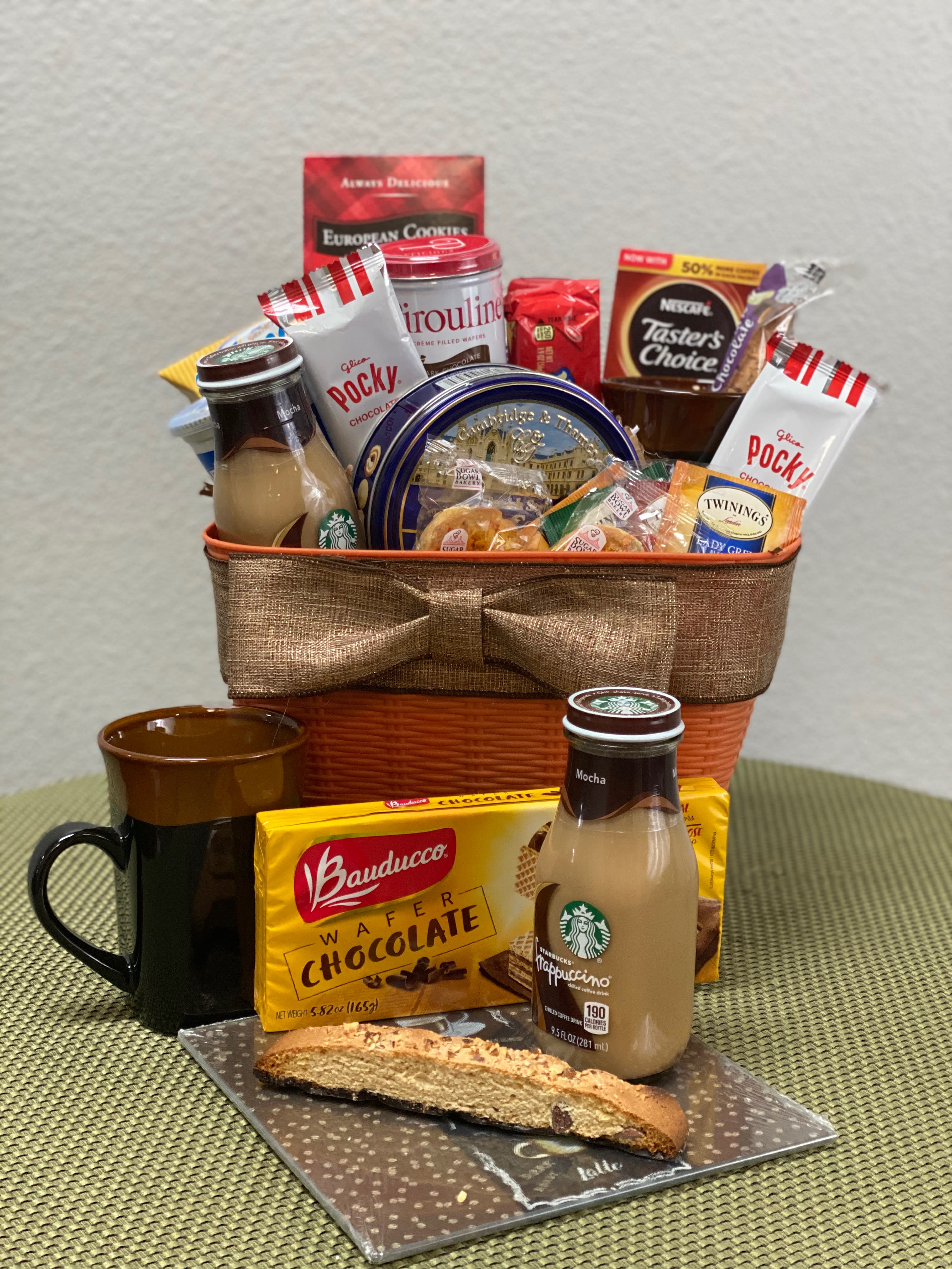 Comforting Basket 103 - Two coffee mugs, cutting board, coffee, tea, assorted snacks. 15% Off USE Code: GB15 at Checkout!