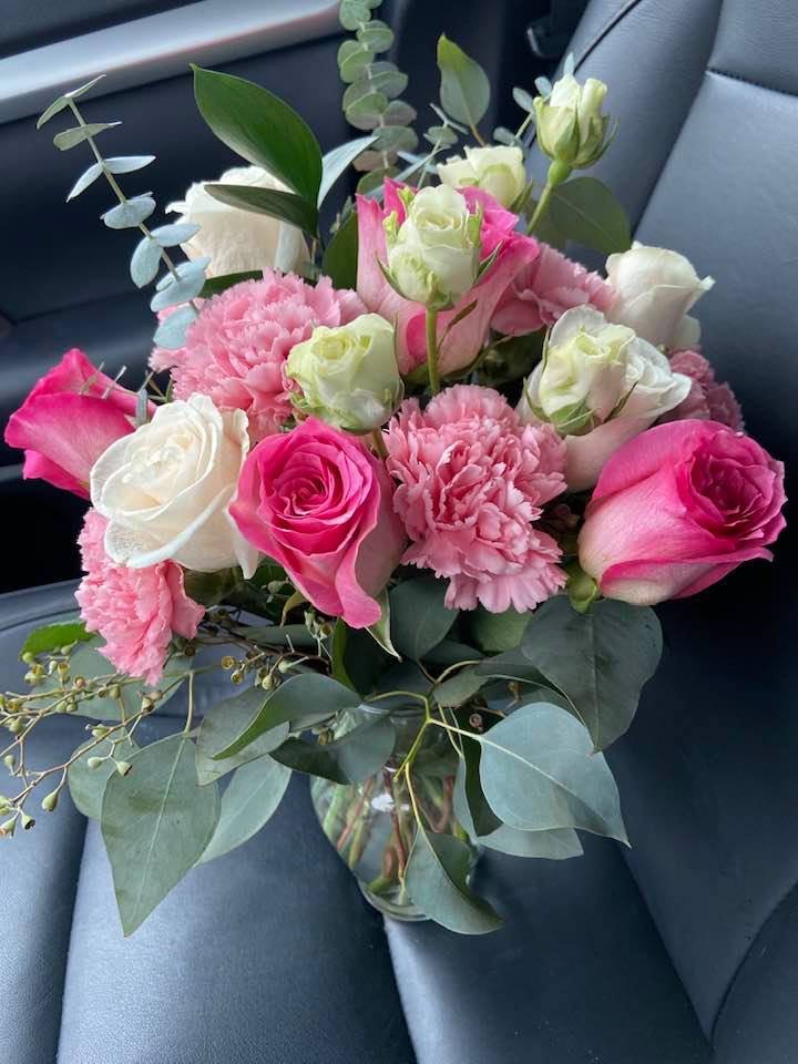 Simply Sweet by Bloom by Nancy - This arrangement includes pink roses, white roses, white spray roses, pink carnations. 