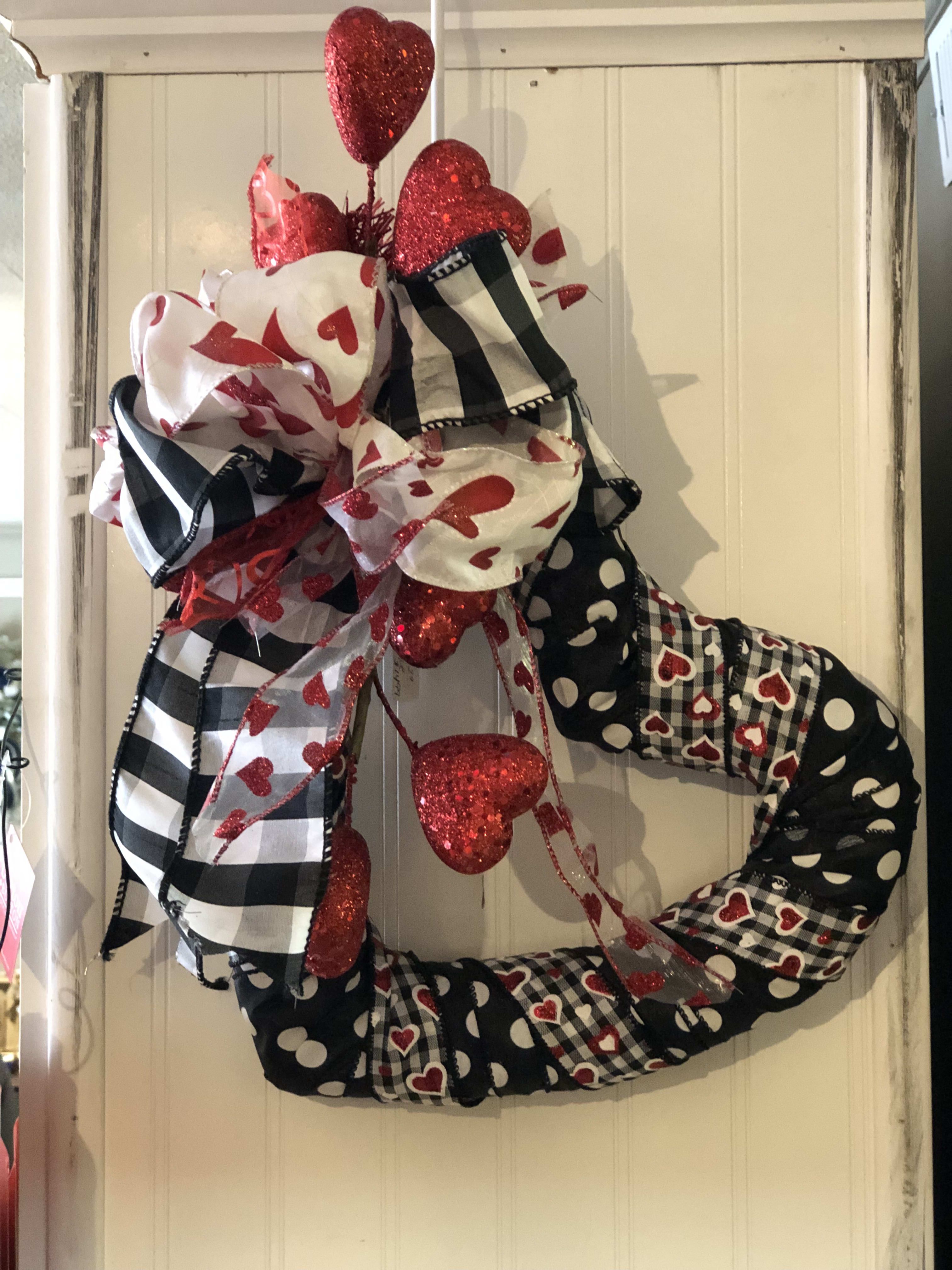 Black and White heart shape hangable by GilMan Florist Inc.