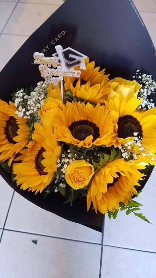 Love Sunflowers  - Yellow Bouquet Wrapped In Black Pepper 