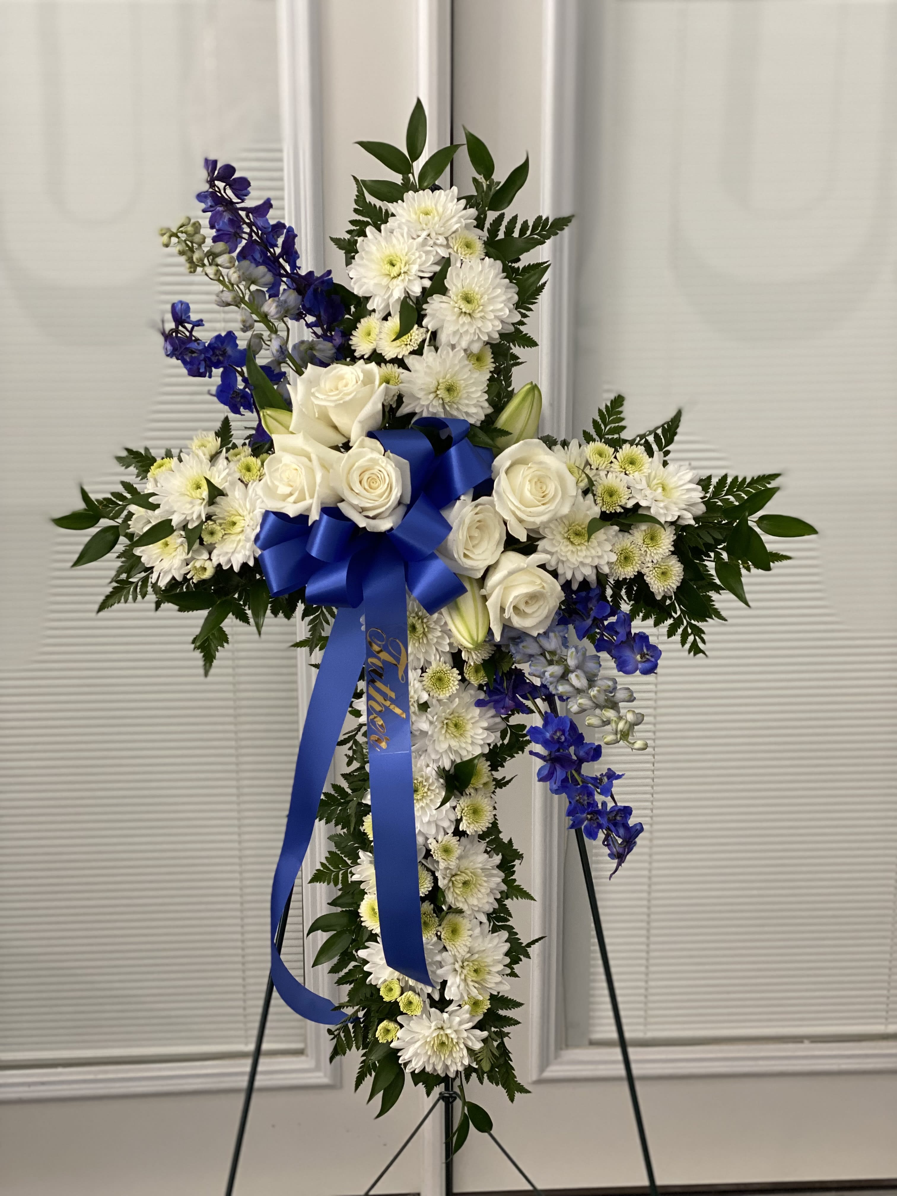 Divine Light - Your message of hope for eternal serenity is delivered ever so elegantly in this graceful cross. Your sincerity will be acknowledged by all who are present.