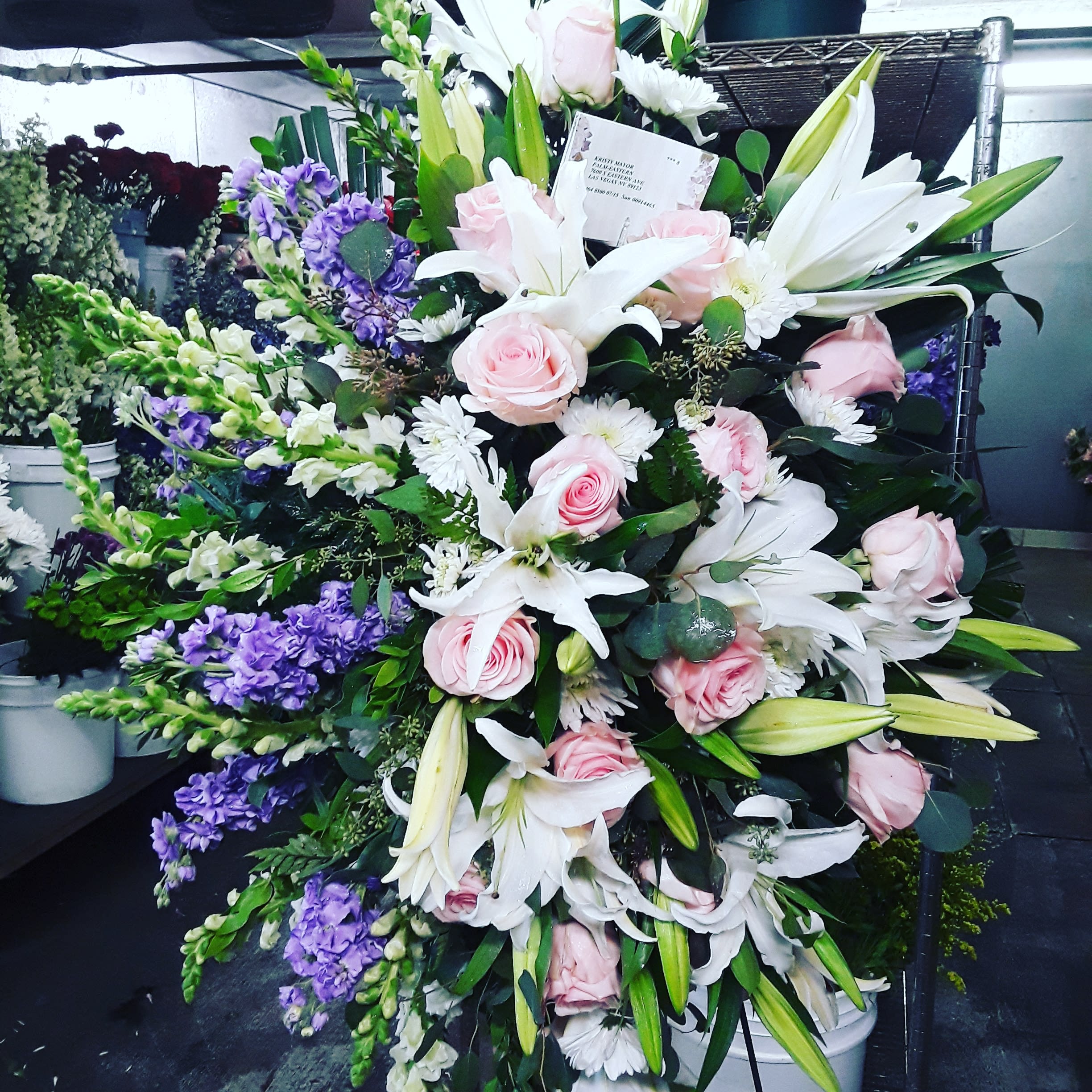 Not Forgotten Not Forgotten - Beautiful arranged spray with a mix of Rose's, stock lilies and spray flowers