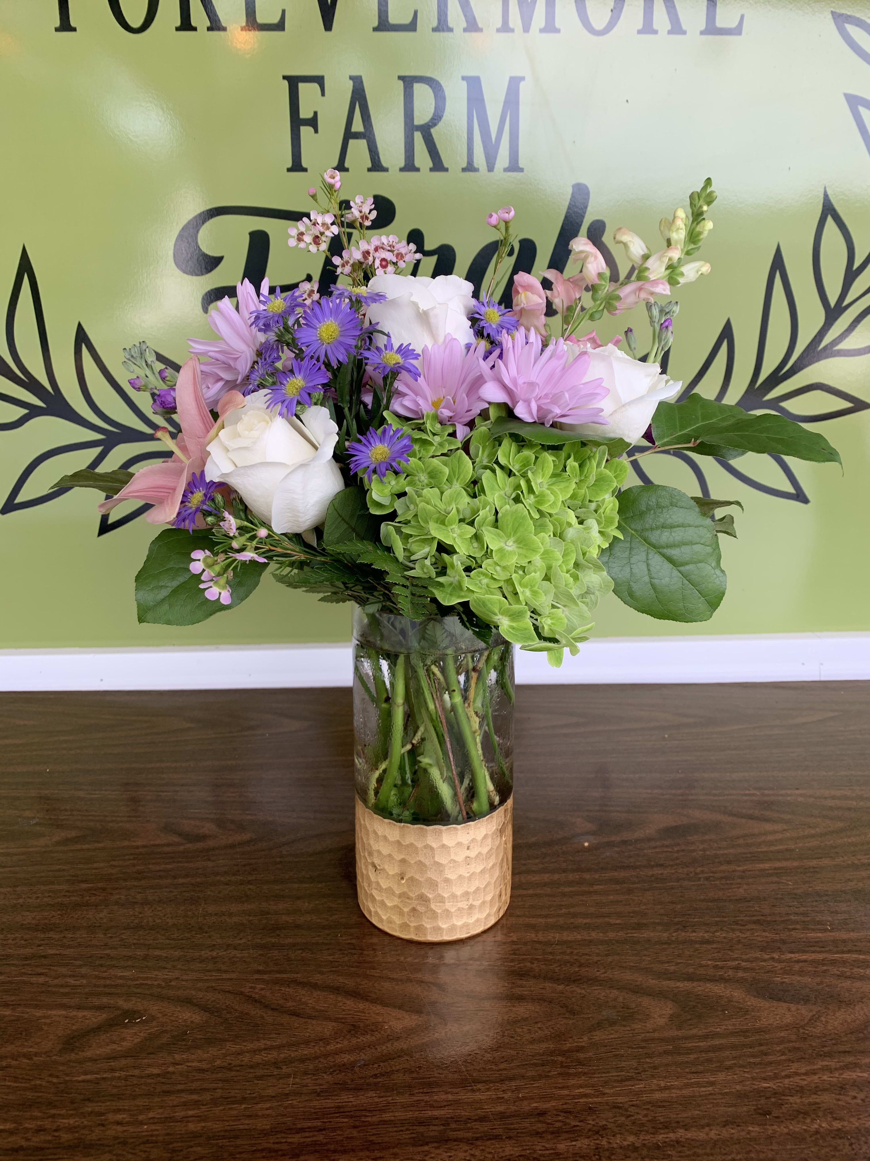Sunday Best! - Our favorite gold dipped vase is perfect for any occasion! Filled with green hydrangea, pink LA lilies, white roses, daisies, and wax flower.