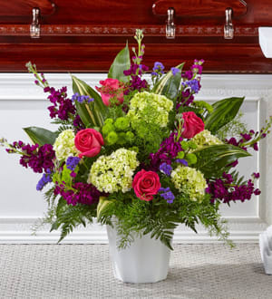 BEAUTIFUL HORIZONS - Bold hydrangea is paired with roses, stock and statice to create our this beautiful sentiment.