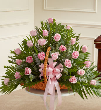 Sincerest Sympathies Fireside Basket - Pink - Product ID: 91216   Send a message of respect, love and hope with this basket filled with pink roses. Our florists create this special sympathy arrangement in a fireside basket with two dozen premium long-stem roses Accented with crisp greenery Usually sent by family members, friends or business associates Delivered directly to the funeral home Due to the urgency of the occasion, our florists use only the freshest flowers available so varieties and colors may vary Measures approximately 24âH x 34âW
