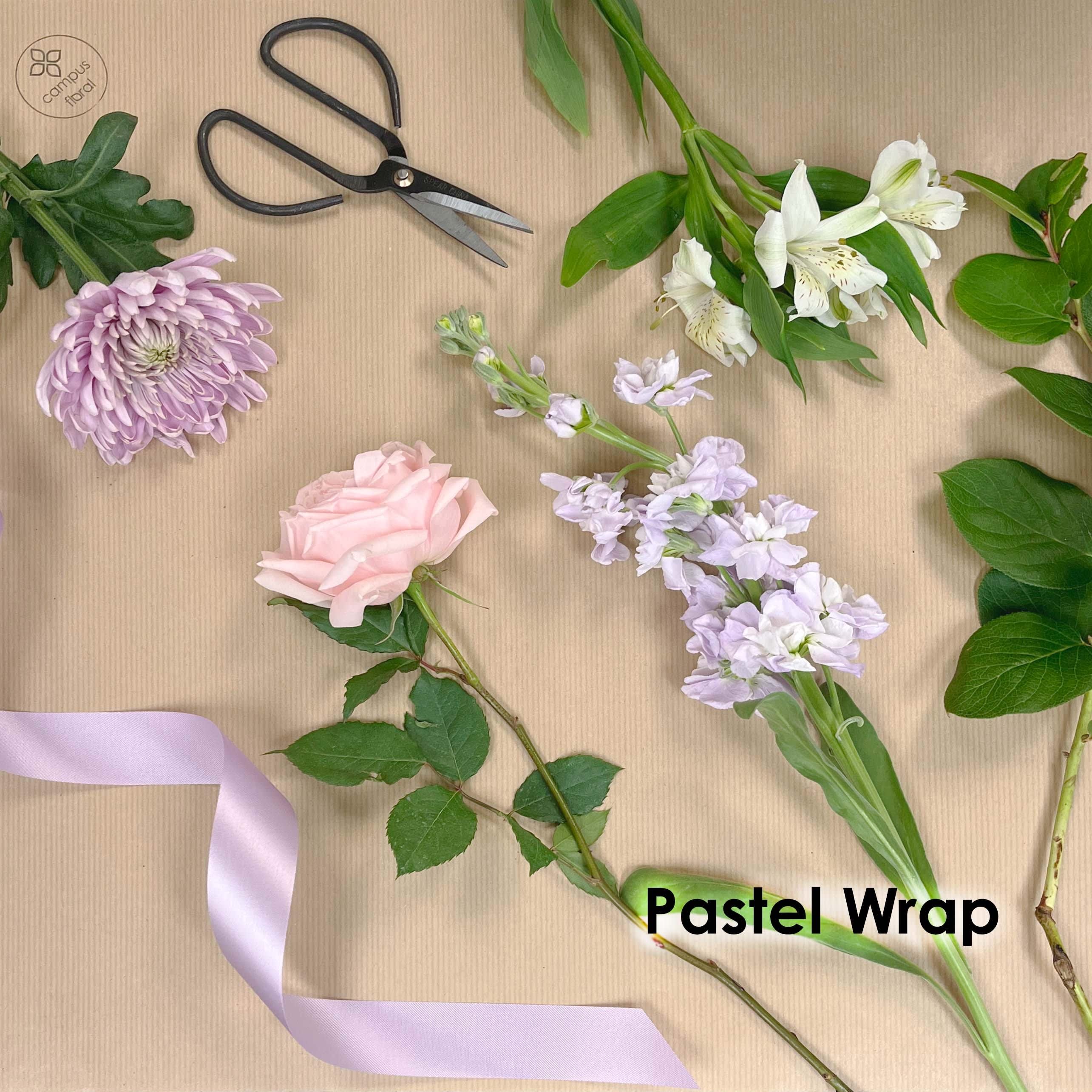 Pastel Wrap  - A lovely bouquet of pastel colored wrapped flowers will bring a smile to anyone who receives it.