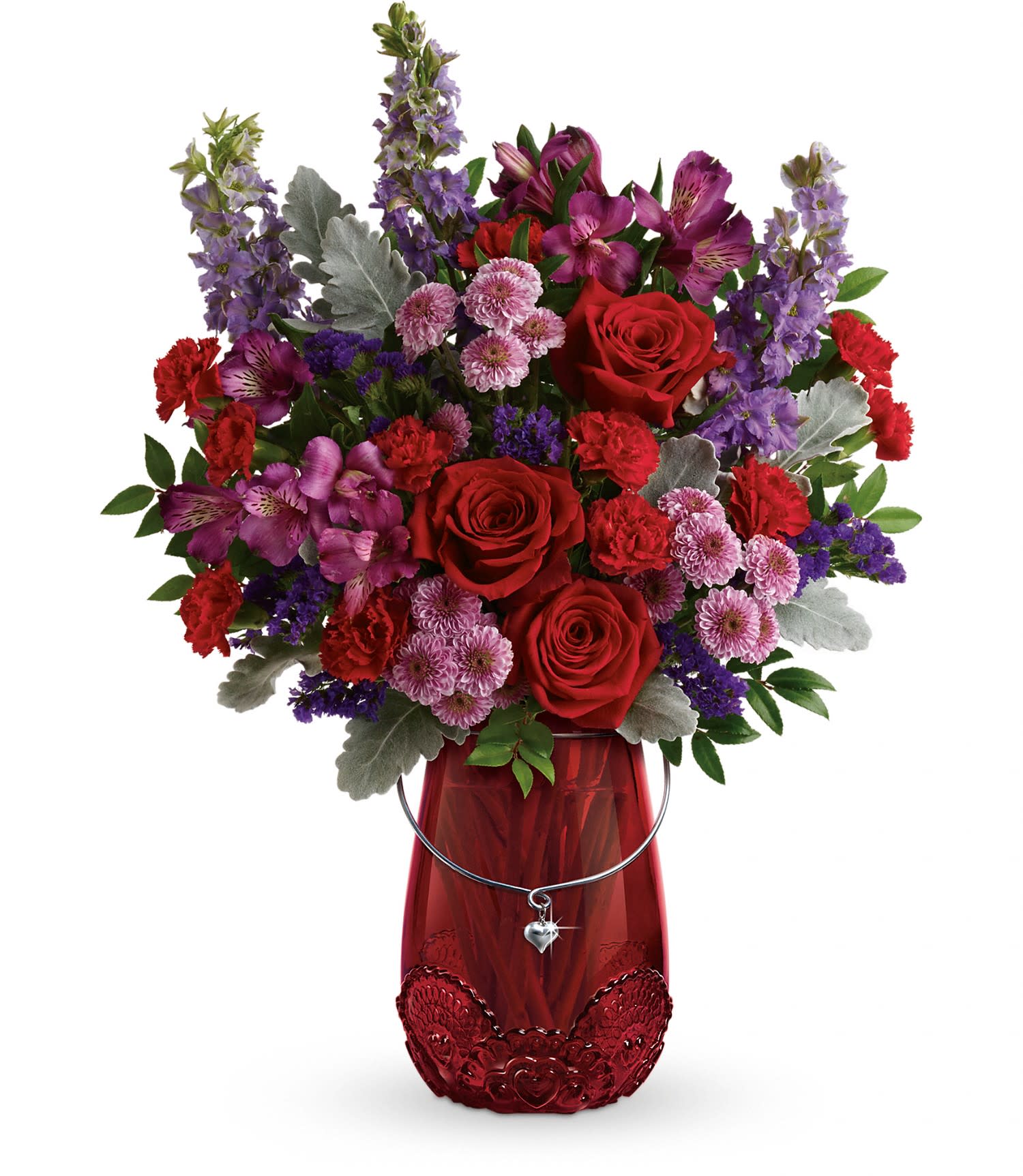 Delicate Heart Bouquet Delicate Heart Bouquet - Delicate lace detail and a sparkling heart charm add to the drama of this breathtaking mixed red rose and purple blooms bouquet, arranged in a stunning glass lantern vase.