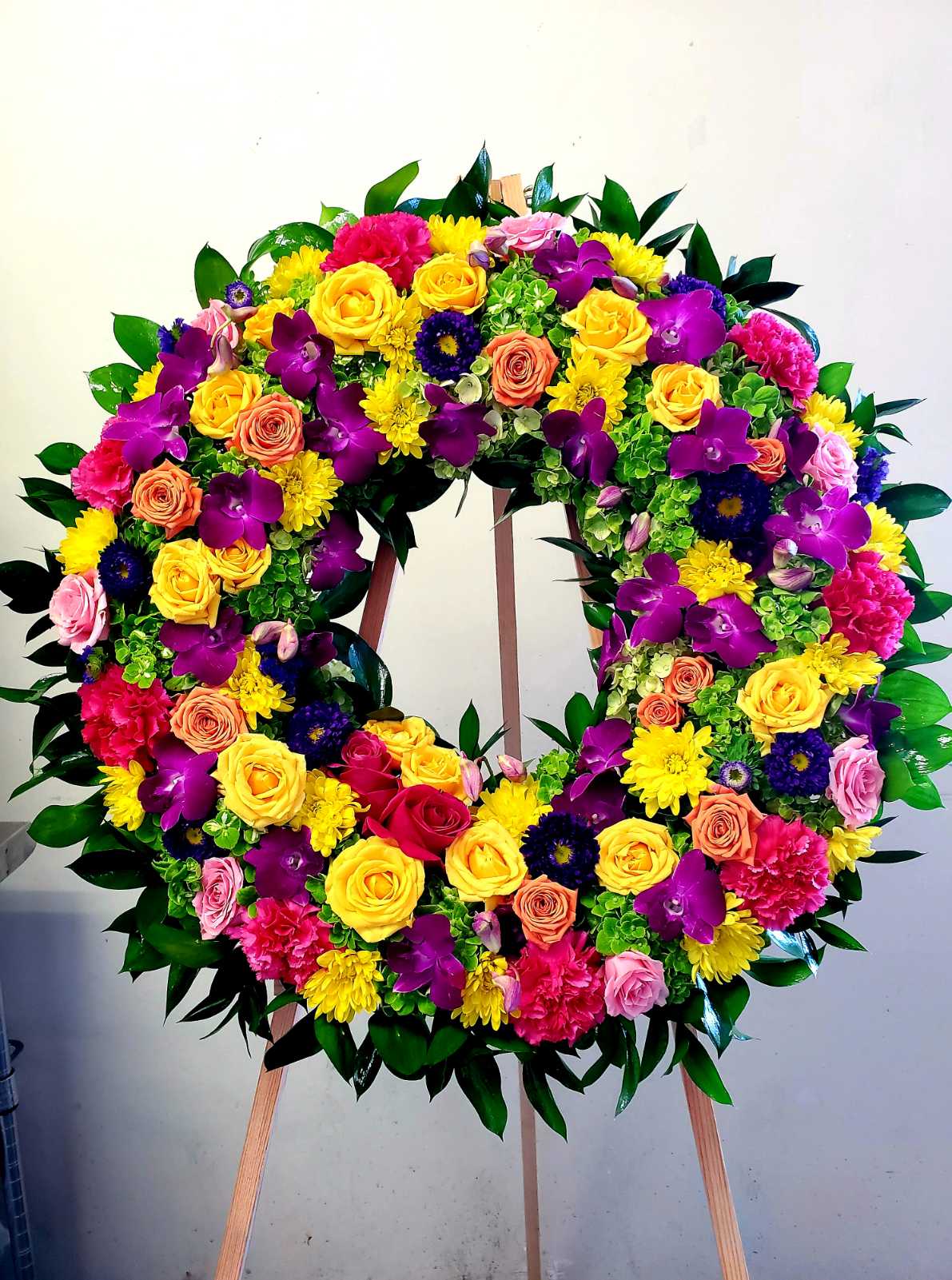 A Colorful Memorial Wreath - 28&quot; in Diameter on a 66&quot; Stand. Perfect for a Memorial Service, Celebration of Life or  Grand Opening of Business.