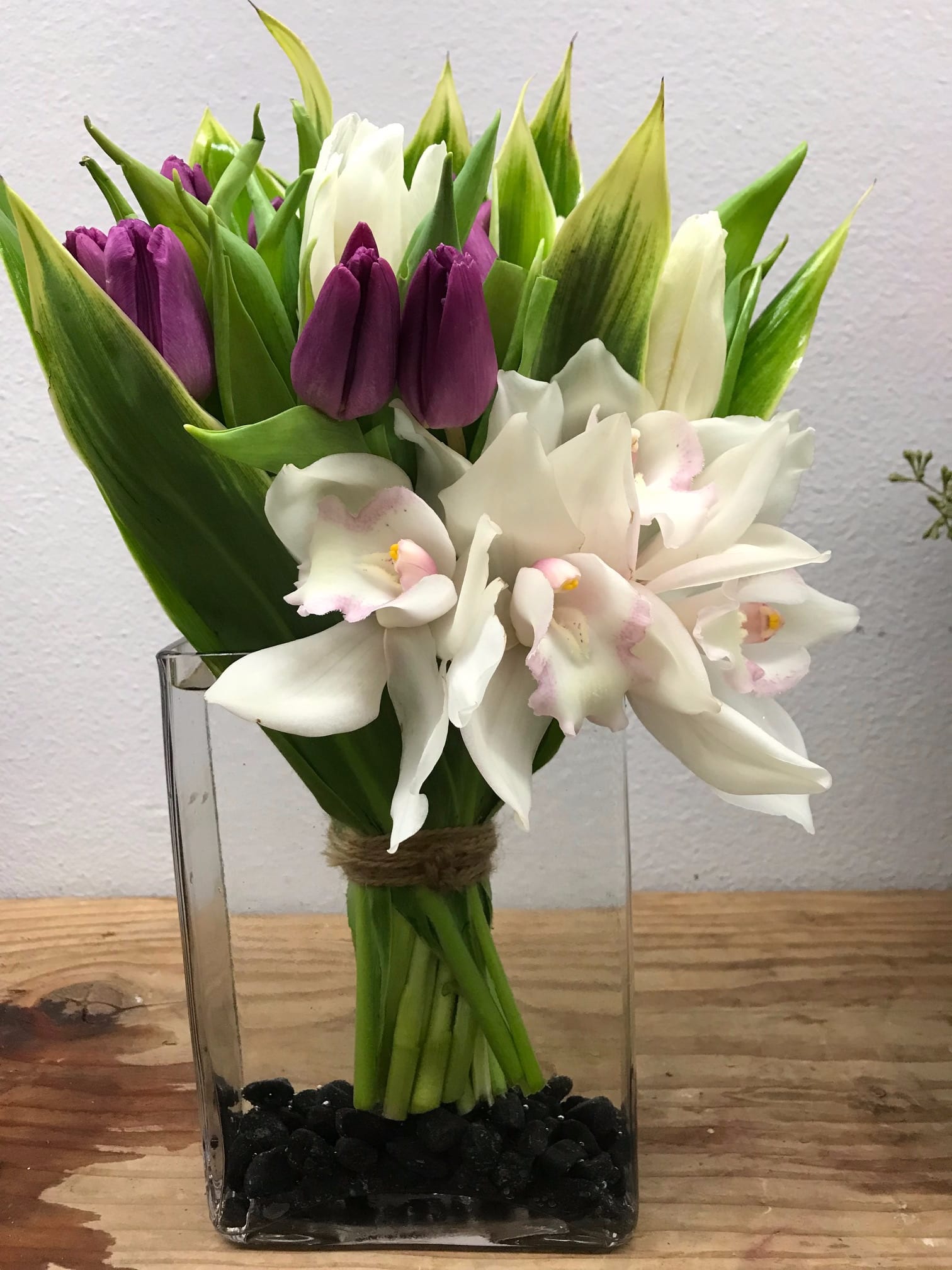 Sophisticated Love - This elegant blend of tulips and orchids is the perfect way to show a friend, family member, or loved one how much you care about them. 