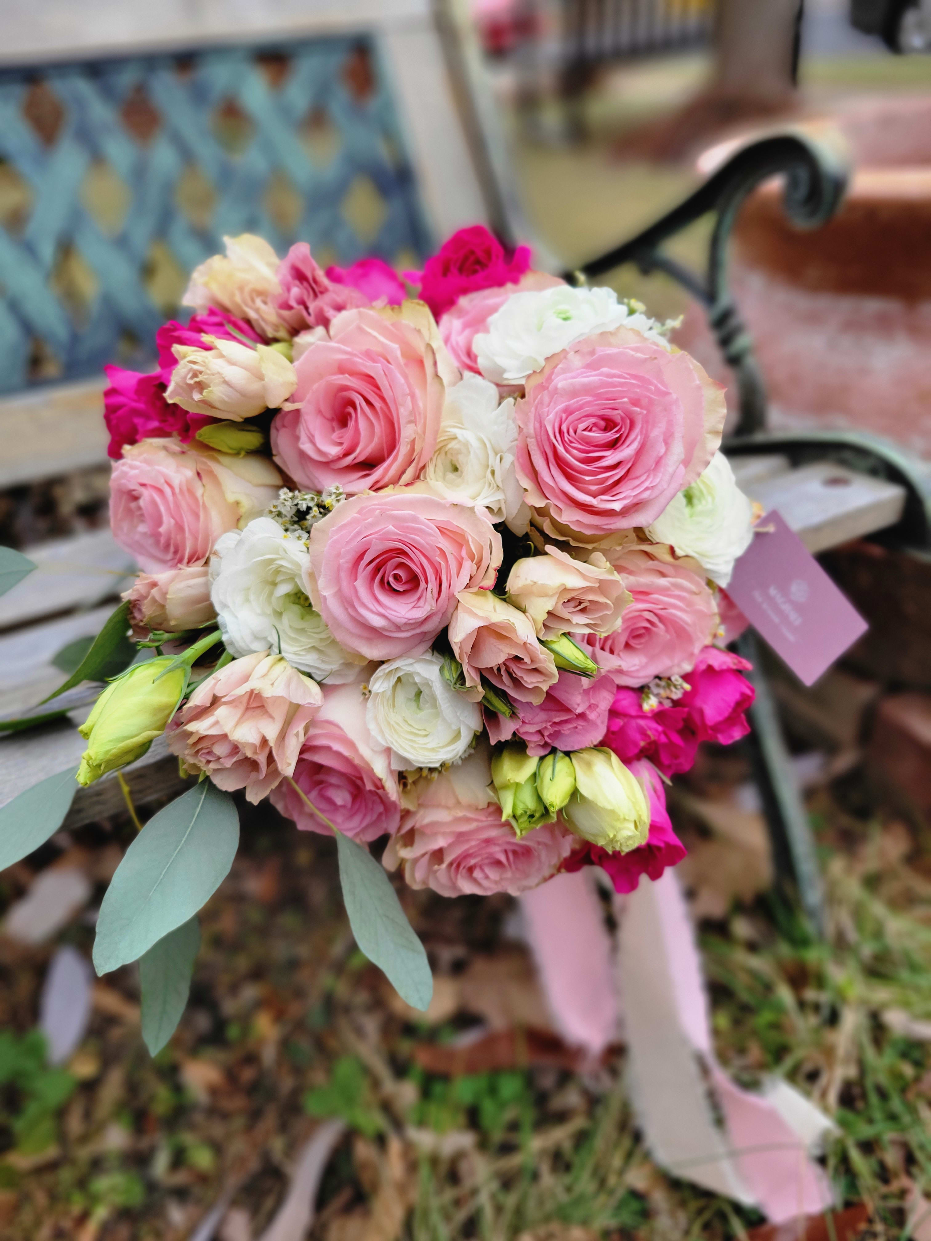 La Vie en Rose - Pink roses, pink lisianthus, white ranunculus, and eucalyptus