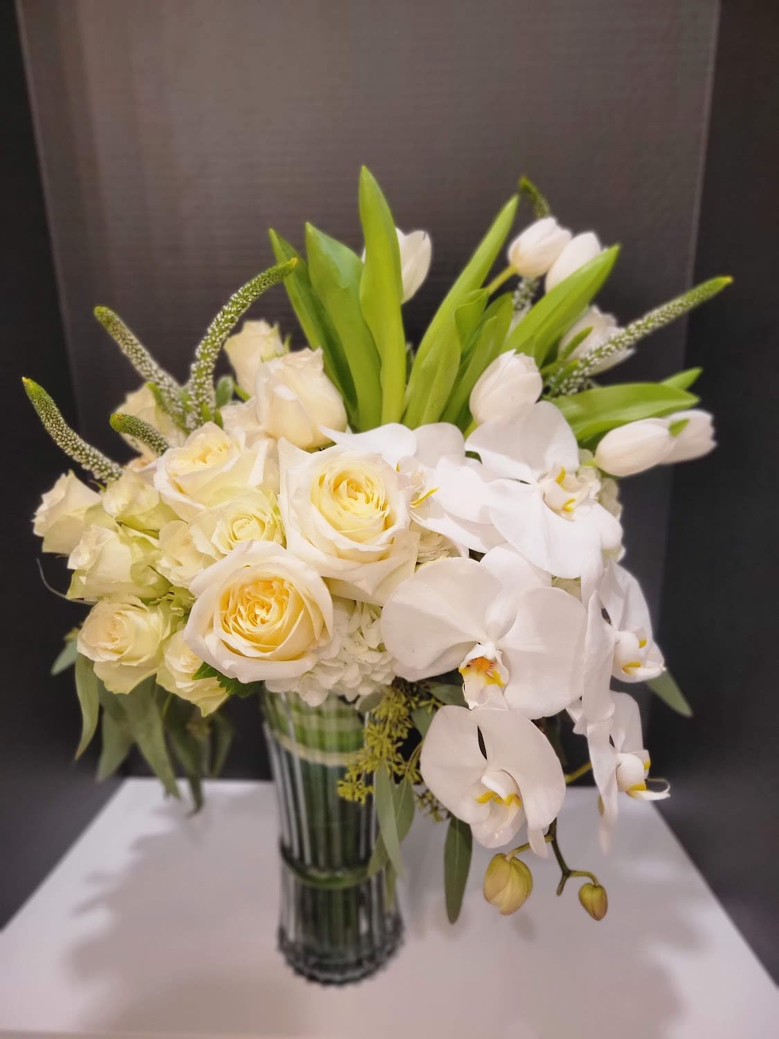 Snowfall - Phalaenopsis,  White Hydrangeas, Roses, Tulips, Veronica, Baby Roses, Eucalyptus 