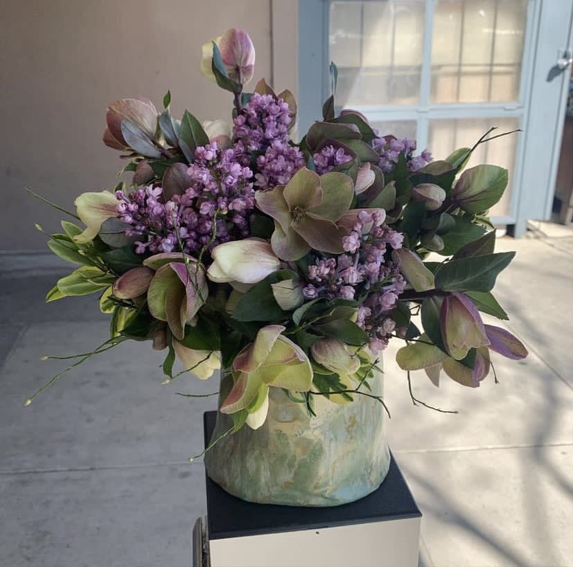 Winter Romance  - This item is only available in winter due to the seasonality of flowers pictured. Romantic garden style arrangement with hellebore and lilac. Vase may vary based on what’s available. 