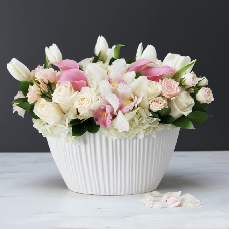 She's Pampered! - Beautiful ceramic vase with tulips, roses, hydrangeas and mini calla lilies. 