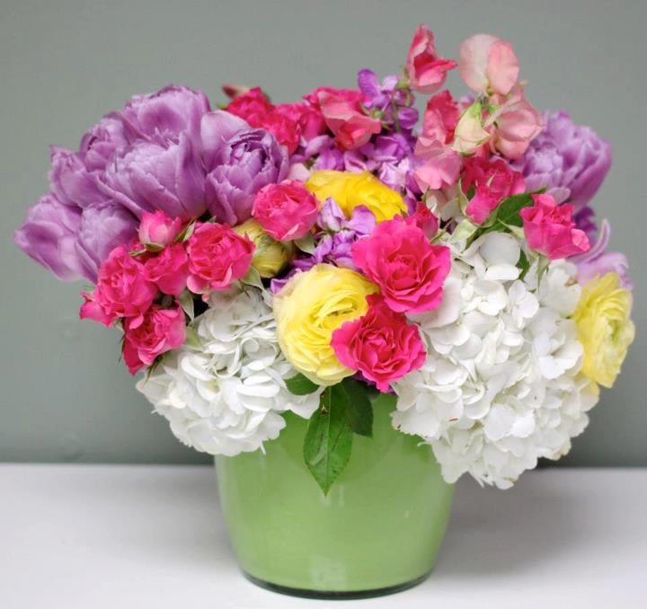 Bouquet Of Tulips &amp; Sweetpeas - Cedar Sinai Florist - Twenty Dutch Tulips accented with white Hydrangeas, Roses, Ranunculus and Sweet Peas in a green Glass Vase from Cedar Sinai Florist. This Spring bouquet makes a perfect gift when you want to brighten someone's day. Order flowers online from Cedar Sinai Florist for same day local flower delivery from our store just minutes from Cedar Sinai hospital. Cedar Sinai Florist is your best option for sending flowers to your loved ones as they recuperate. Nothing brightens someone's day like a beautiful bouquet, and we know that they will love whatever you choose to send. 