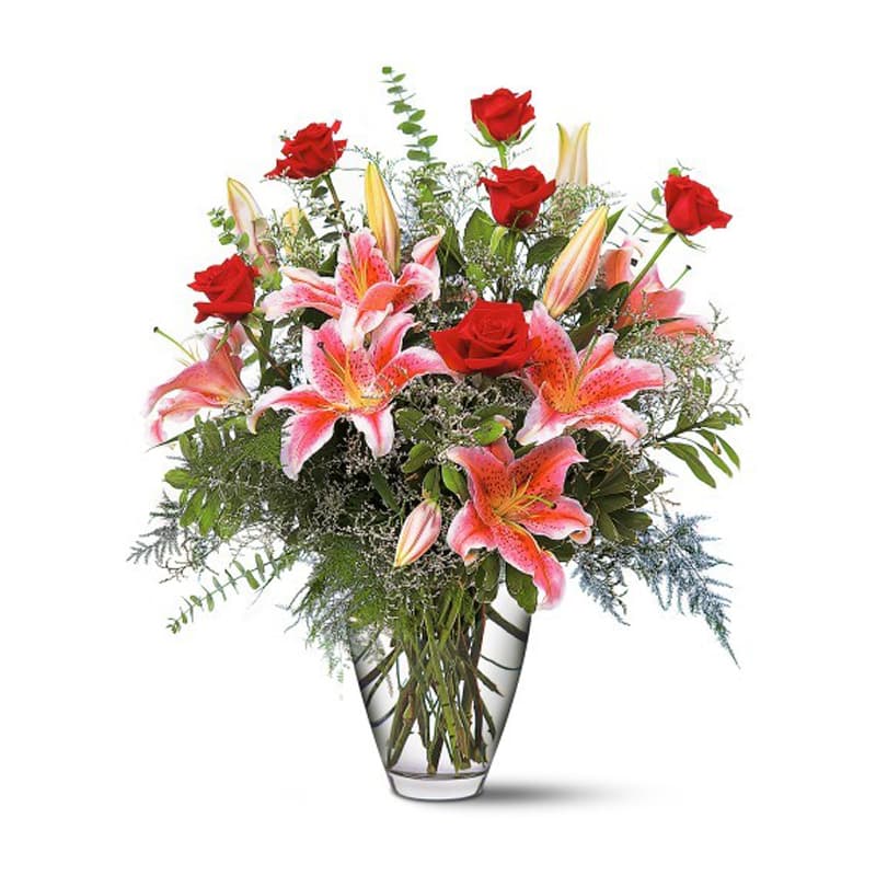 Celebrations Bouquet [TF115-1] - This romantic arrangement of stargazer lilies and red roses will help to celebrate any occasion with style.  Stargazer lilies, roses and eucalyptus arrive in a clear glass vase.  Approximately 23&quot; W x 26-1/2&quot; H  Orientation: One-Sided      As Shown : TF115-1  
