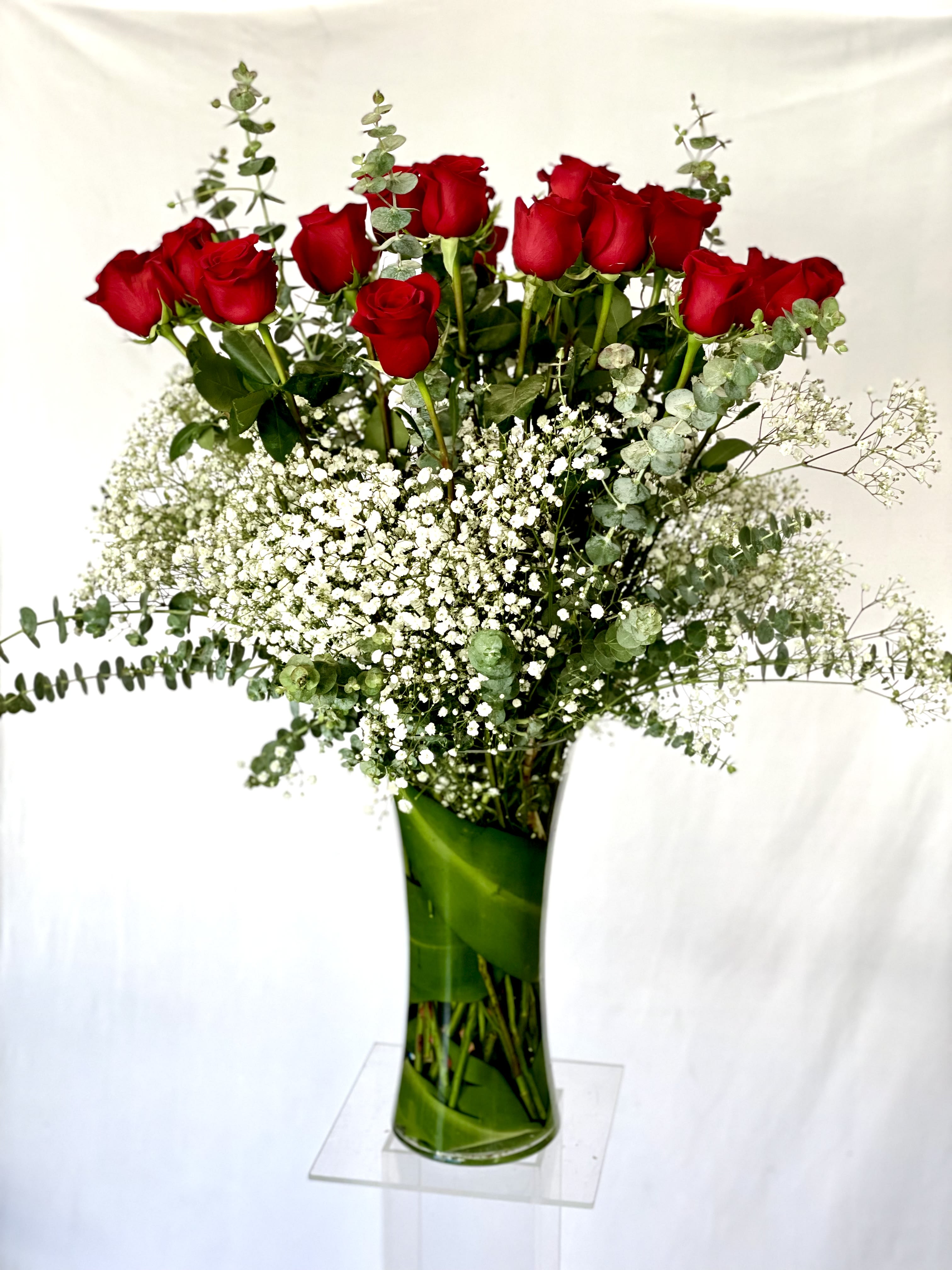 Dozen Red Roses - 70cm long stem red roses, babies breath, green fillers in a tall clear glass vase