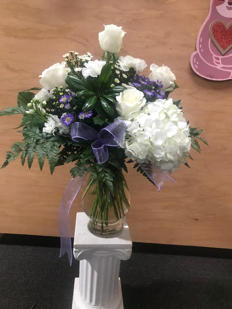 Lavender Touched White Lavender Touched White - White hydrangea and roses paired with a variety of greens touch with purple aster
