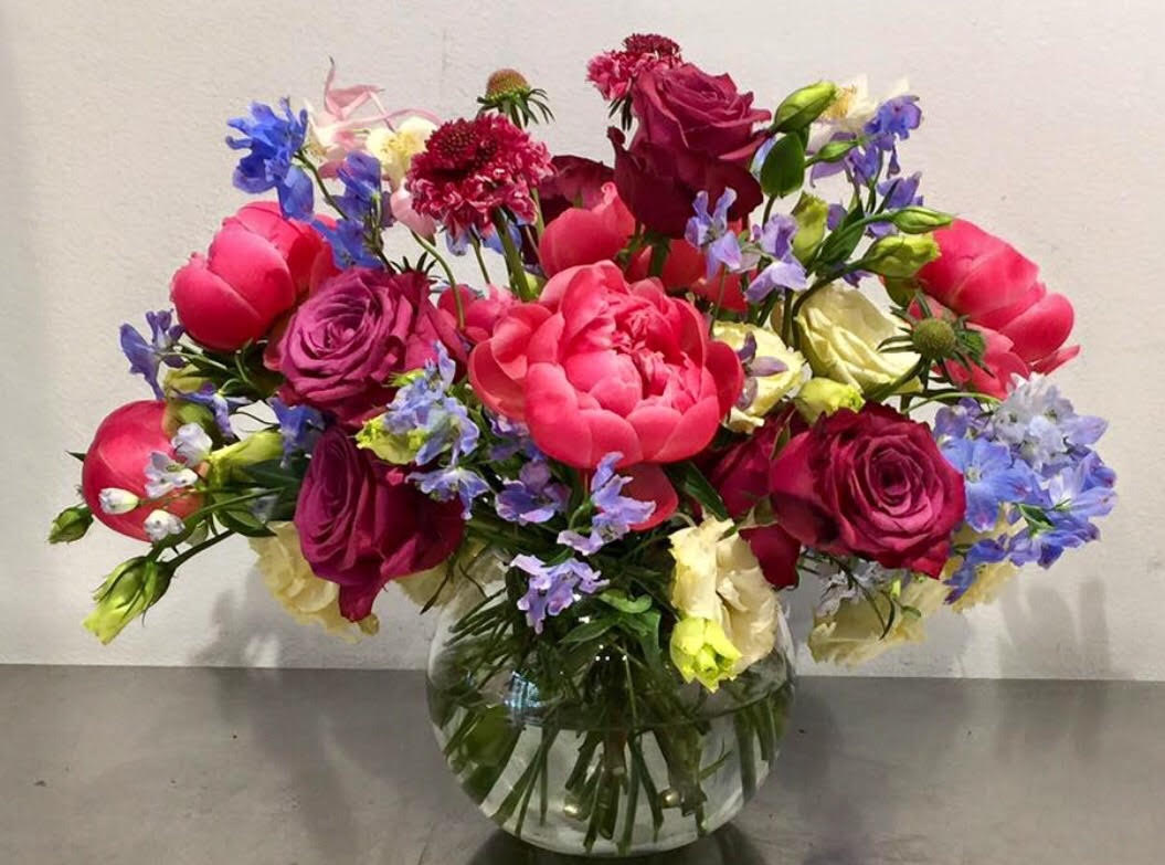Lavishly Classic Blooms - Refreshing arrangement with red, blue, and white flowers.