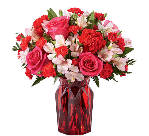 Adore You Bouquet - Fall in love at first sight with our Adore You Bouquet. Beautifully designed with pink roses, red carnations and sweet pink alstroemeria, this flower arrangement is sure to have them blushing all Valentine’s Day long!