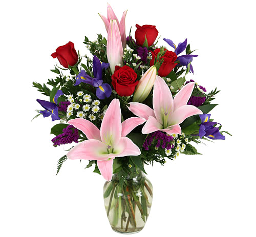 You Are Special  Arrangement - Express your sentiments with this beautiful floral arrangement, featuring red roses, gorgeous pink Stargazer lilies, matsumoto asters, carnations, irises and delicate white asters. Go ahead and show them how you feel!