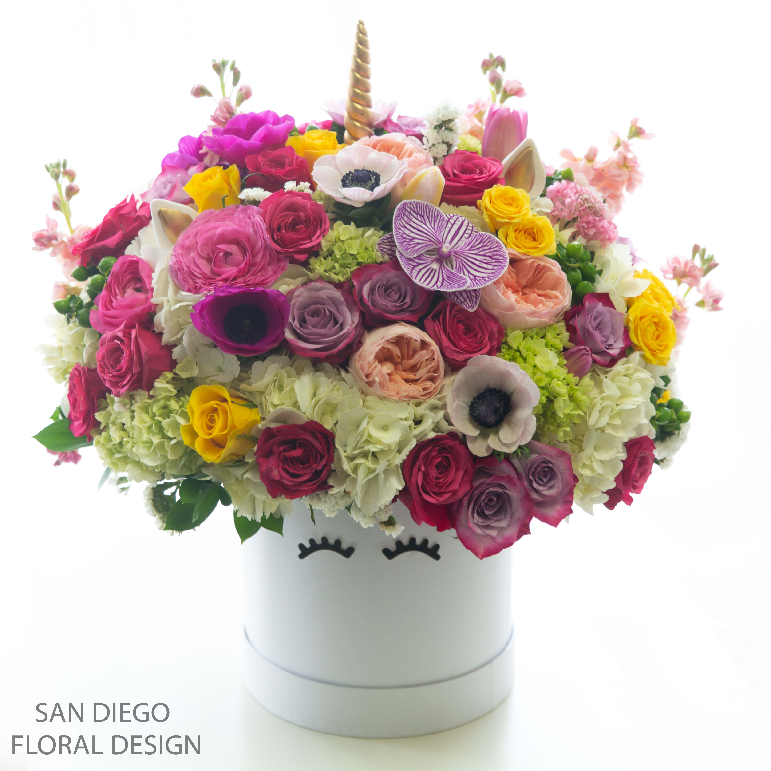 Chasing Unicorns Hat Box   - Deliver a touch of magic with our signature Unicorn  Luxe  Bloom hat box filled with gorgeous fresh hydrangeas, roses, anemones, stock, ranunculus. 
