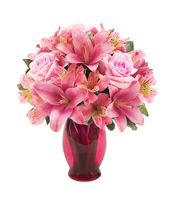 Ruby Array - An array of thankful emotions will overcome Mom when see receives this beautiful arrangement of pink Asiatic lilies, light pink roses and pink alstroemeria in a pink fluted vase. Measures 12&quot;H by 10&quot;L.