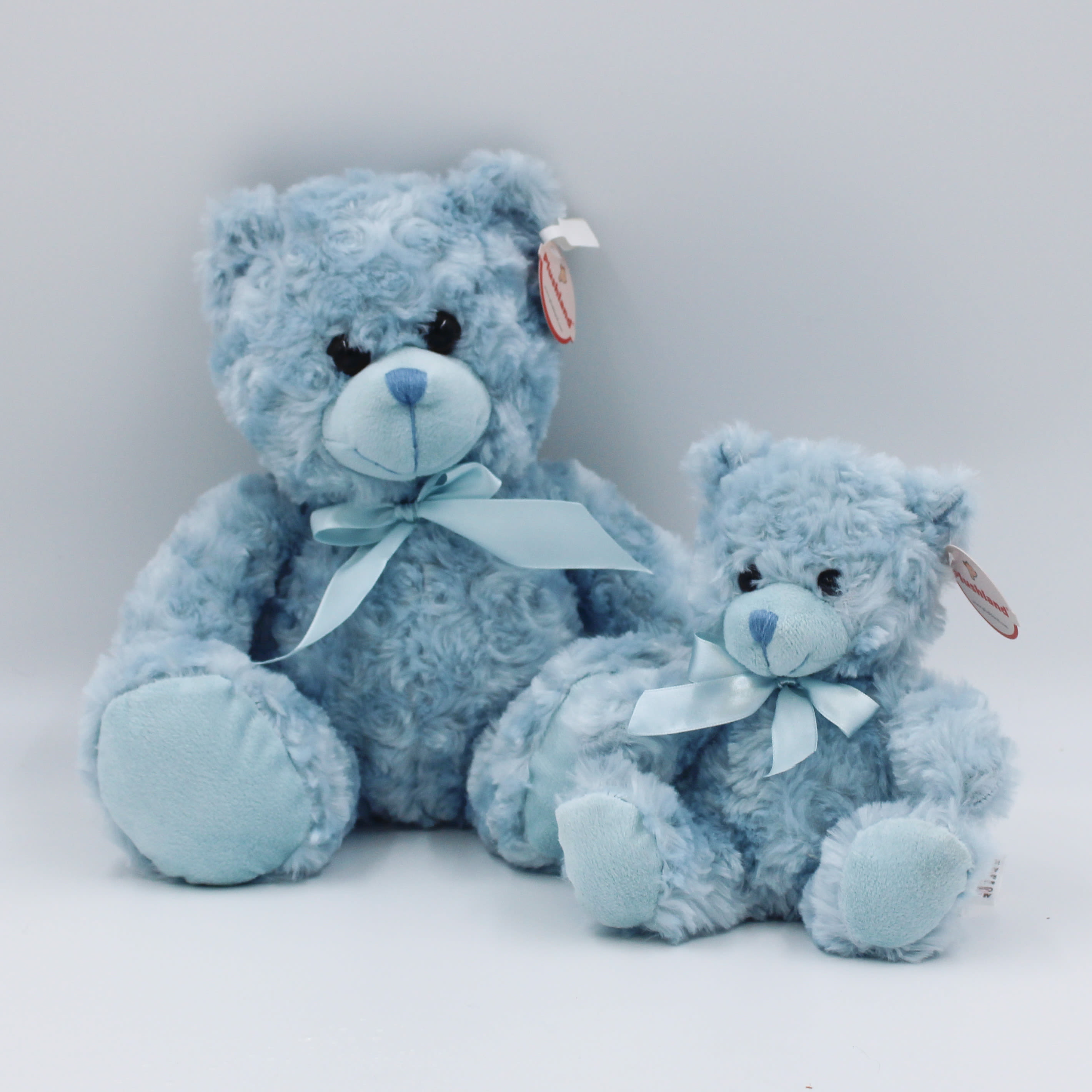 Teddy Bear of Designer Blue Orchids Arrangement