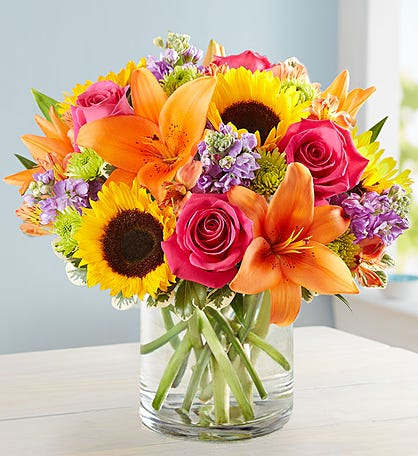 Mix flowers bouquet on clear vase Mix flowers bouquet on clear vase - Mix flowers