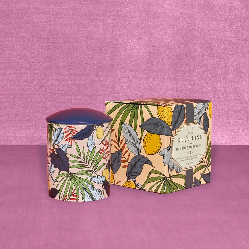 Mansour Marrakech Botanical Scented Candle Mansour Marrakech Botanical Scented Candle - Mansour Marrakech: Infused with essential oils and featuring notes of bergamot, ginger dusted citrus, green tea, touches of apple, juniper and clove above peppered jasmine and tobacco. Housed in scent specific, artfully printed, ceramic candle holders. Candles come in a beautifully packaged gift box and are sustainably sourced, free from pthalates and parabens and made with 100% organic cotton wick. L’or de Seraphine provides one-of-a-kind fragrances for people who find delight and respite through color and scent to complement their own originality and to create their personal sanctuary.