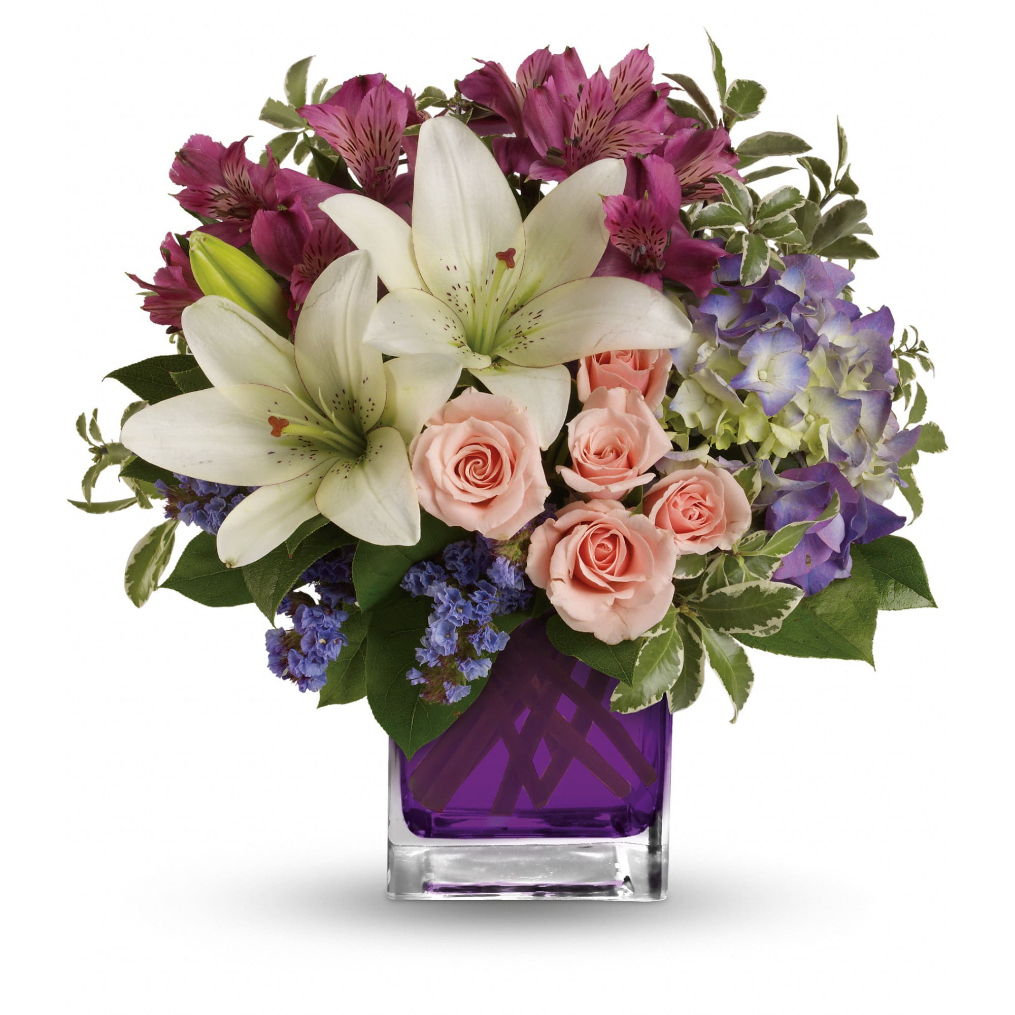 Garden Romance - Hello, gorgeous! This lovely bouquet includes purple hydrangea, light pink spray roses and white asiatic lilies arranged in our vibrant violet glass cube. 