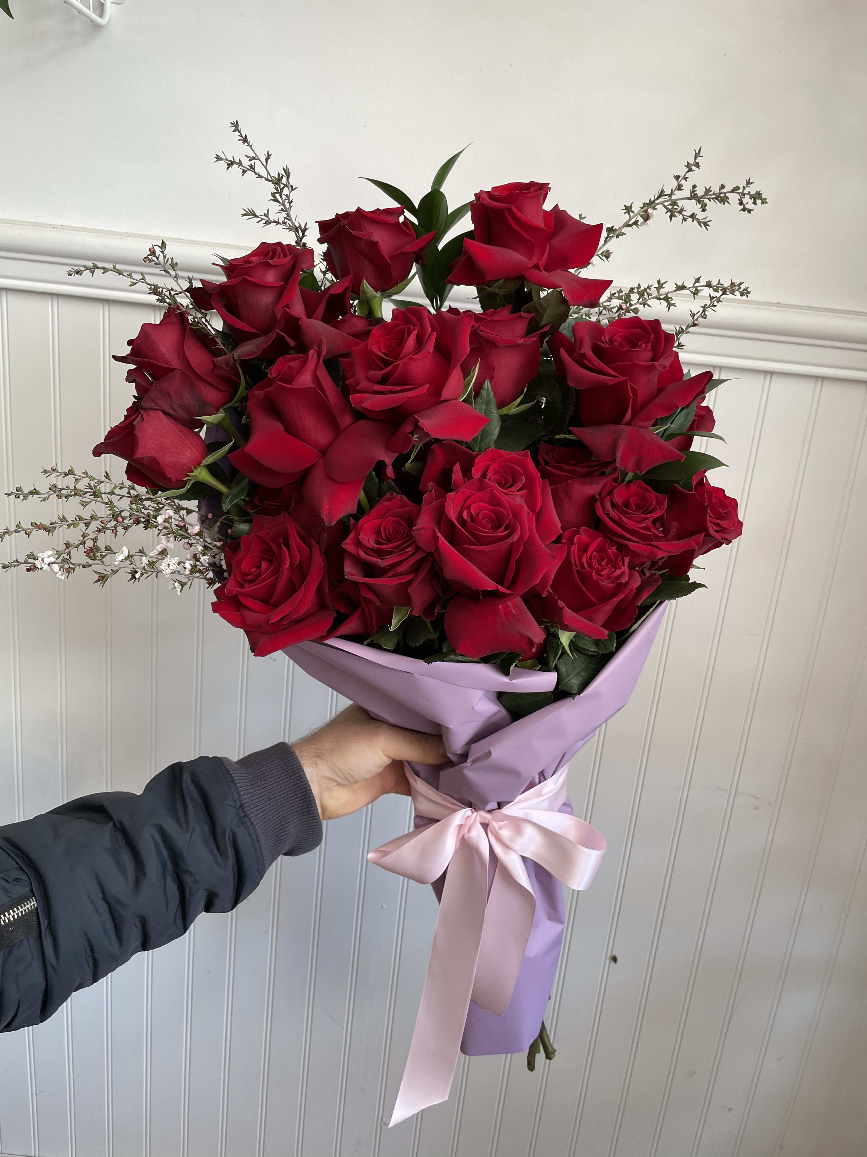 Red Roses Bouquet with Beautiful Pink Ribbon Around