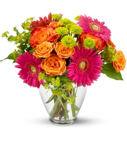 End of the Rainbow - Hot fun in the summertime is here and it's flowerific to be sure! This beautiful bouquet brings together a rainbow of the season's brightest blossoms. Hot pink gerberas orange bi-color roses orange spray roses and green button spray chrysanthemums are delivered in a charming glass vase.Approximately 8&quot; W x 12&quot; H Orientation: All-Around As Shown : T157-2ADeluxe : T157-2BPremium : T157-2C