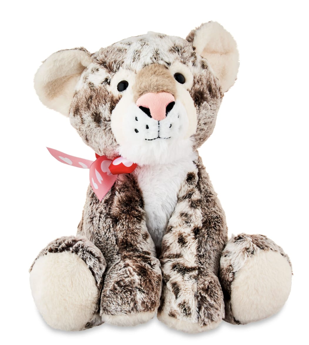 Large Plush Leopard - Surprise a loved one with this 14-Inch Leopard Plush. This festive plush is the perfect way to let someone know you are thinking of them. Made with soft-to-the-touch plush material, you'll want to cuddle this plush leopard for hours. The red bow adds an extra special touch to this adorable stuffed animal. Great for kids and adults alike, pair this with chocolates, flowers, and more for a memorable celebration. Will be packaged in a deluxe gift bag with tissue paper &amp; bow.